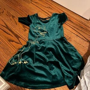 Green velvet dinosaur dress from Princess Awesome